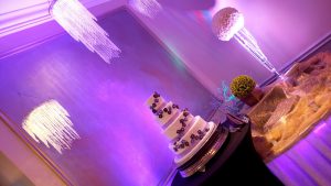 cakce and decor at empty hall at chicago wedding venues